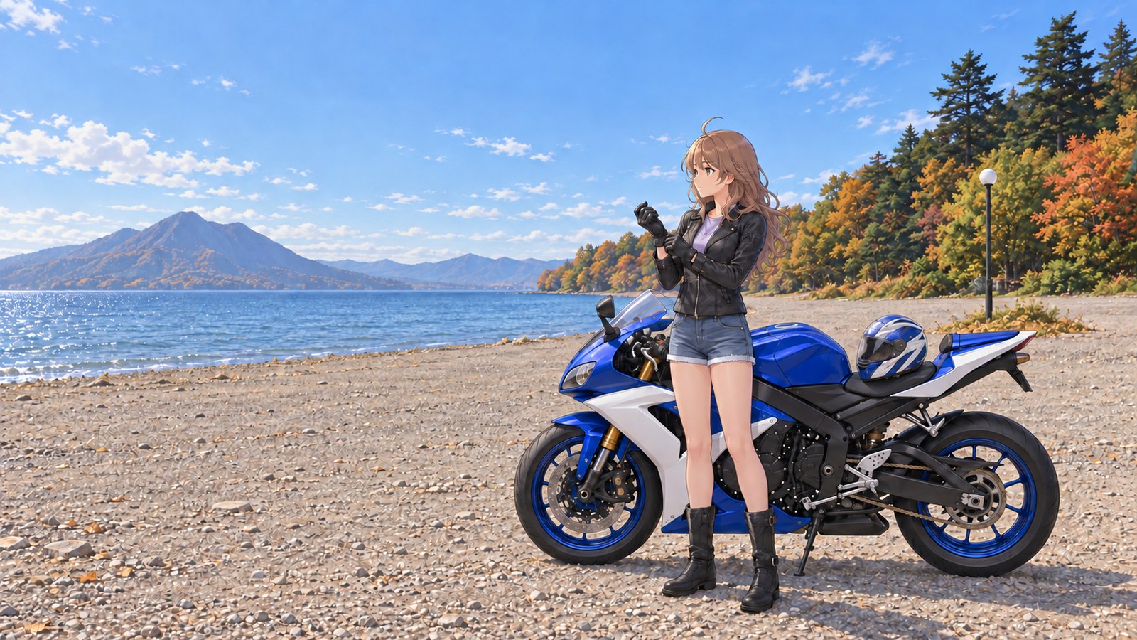 In the gravel car park at Poropinai on Lake Shikotsu in autumn, a woman wearing a black riding jacket, denim shorts, tights and tall black boots adjusts the cuffs of her gloves beside a parked blue-and-white motorbike. One helmet rests on the seat. The lake and mountains are on the left; on the right are a forest mixing autumn foliage and evergreen trees, and a spherical lamp.