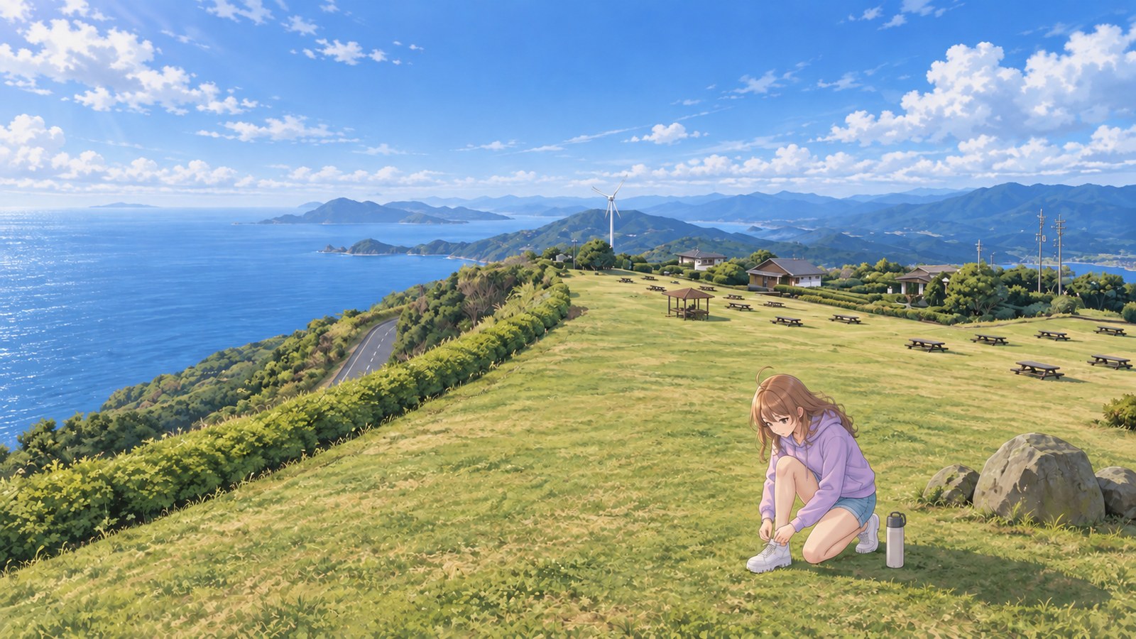 The grassland at Senjojiki in early May. A woman in a lavender hoodie, denim shorts, opaque tights, and white sneakers kneels on one knee to tie her laces. A bottle is beside her knee; the Sea of Japan and islands are to the left, grassland and a table to the right, and wind turbines in the distance.