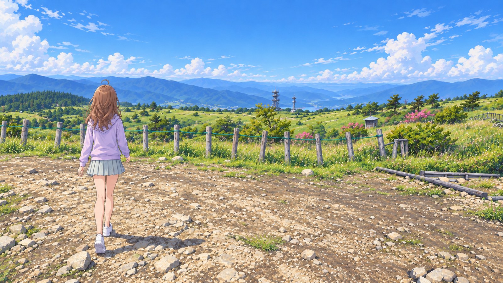 At Takabocchi Highland in early summer, a woman in a pale lavender hoodie and skirt walks away along a path scattered with stones. Beyond wooden posts and green rope, grassland and distant mountain ranges stretch on.
