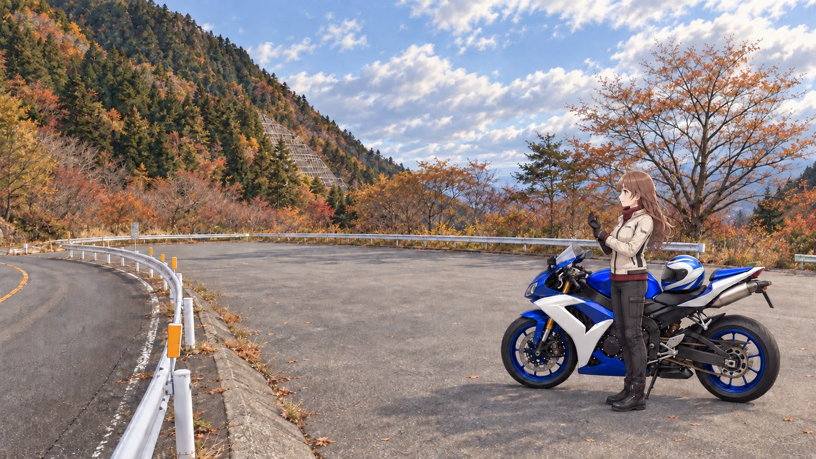 In front of an autumn-colored slope, a woman wearing a cream riding jacket and scarf adjusts her gloves beside a blue-and-white motorcycle. Her helmet is on the seat.