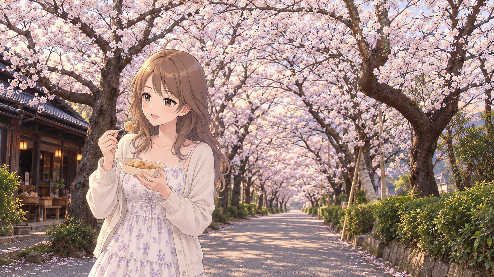 Under the cherry trees on Sugi-no-Baba in Akizuki, a woman in a pale floral dress and cardigan lifts a piece of kuzumochi from a small dish with a toothpick. The blossoms are in full bloom and overlap overhead.