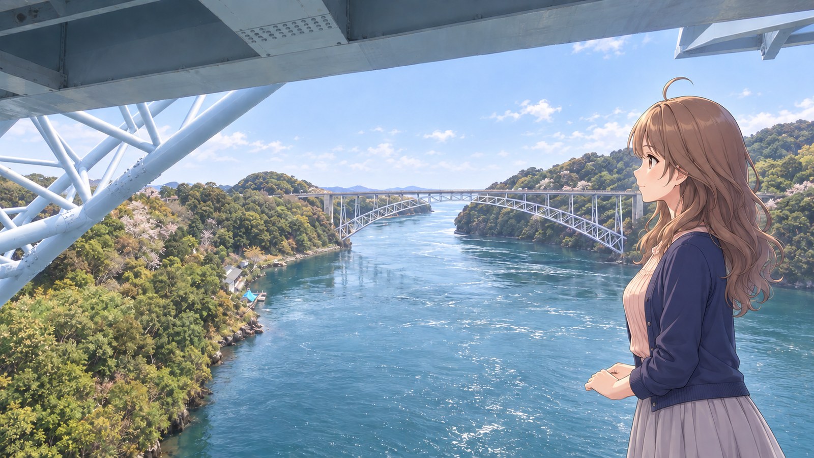 A woman in a navy cardigan and gray skirt looks through the girders of Shin-Saikai Bridge toward the arch of Saikai Bridge and Hario Strait. Spring daylight, with cherry blossoms among the greenery on both shores.