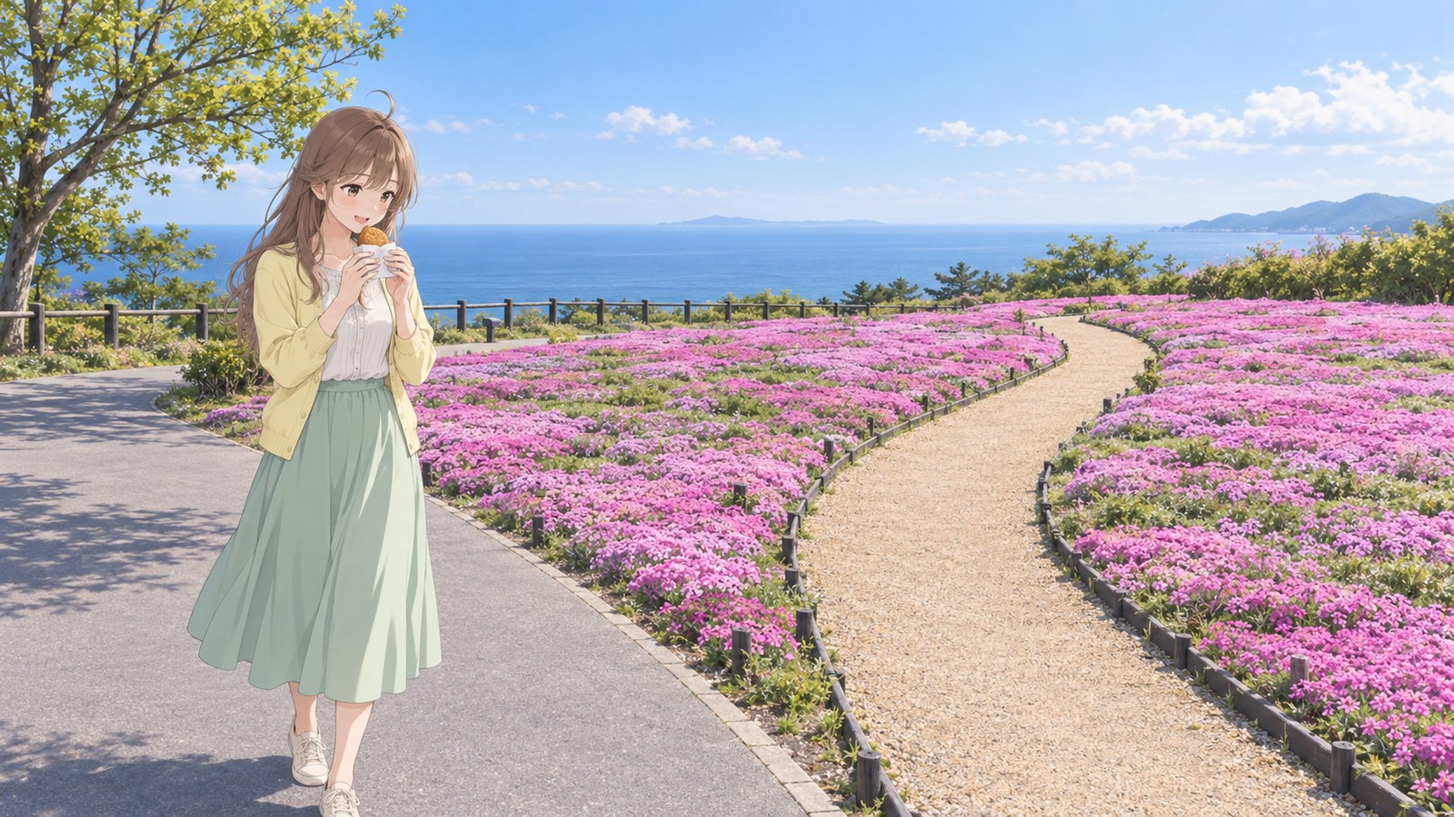 A woman in a pale yellow cardigan and long mint skirt holds a paper-wrapped piece of tempura near her mouth, with moss phlox and the sea behind her at Sora Lookout.