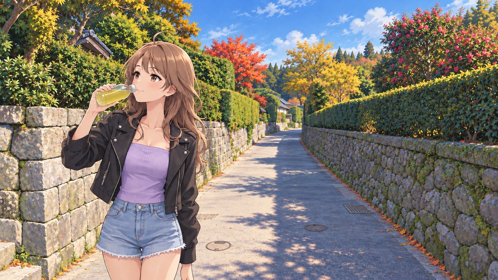 A woman drinks bottled Chiran tea beside a stone wall and hedge on the street of samurai residences in Chiran in autumn. She wears a black jacket, lavender top and denim shorts.